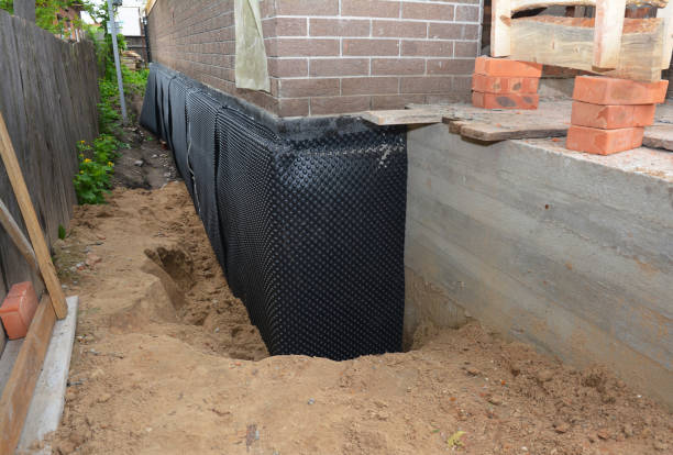 SJ Waterproofing Pros technician performing targeted Waterproofing assessment in Englishtown, NJ
